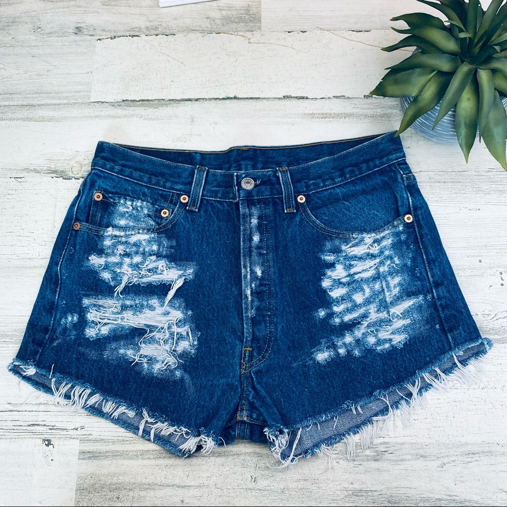 Levi button fly distressed cut off shorts